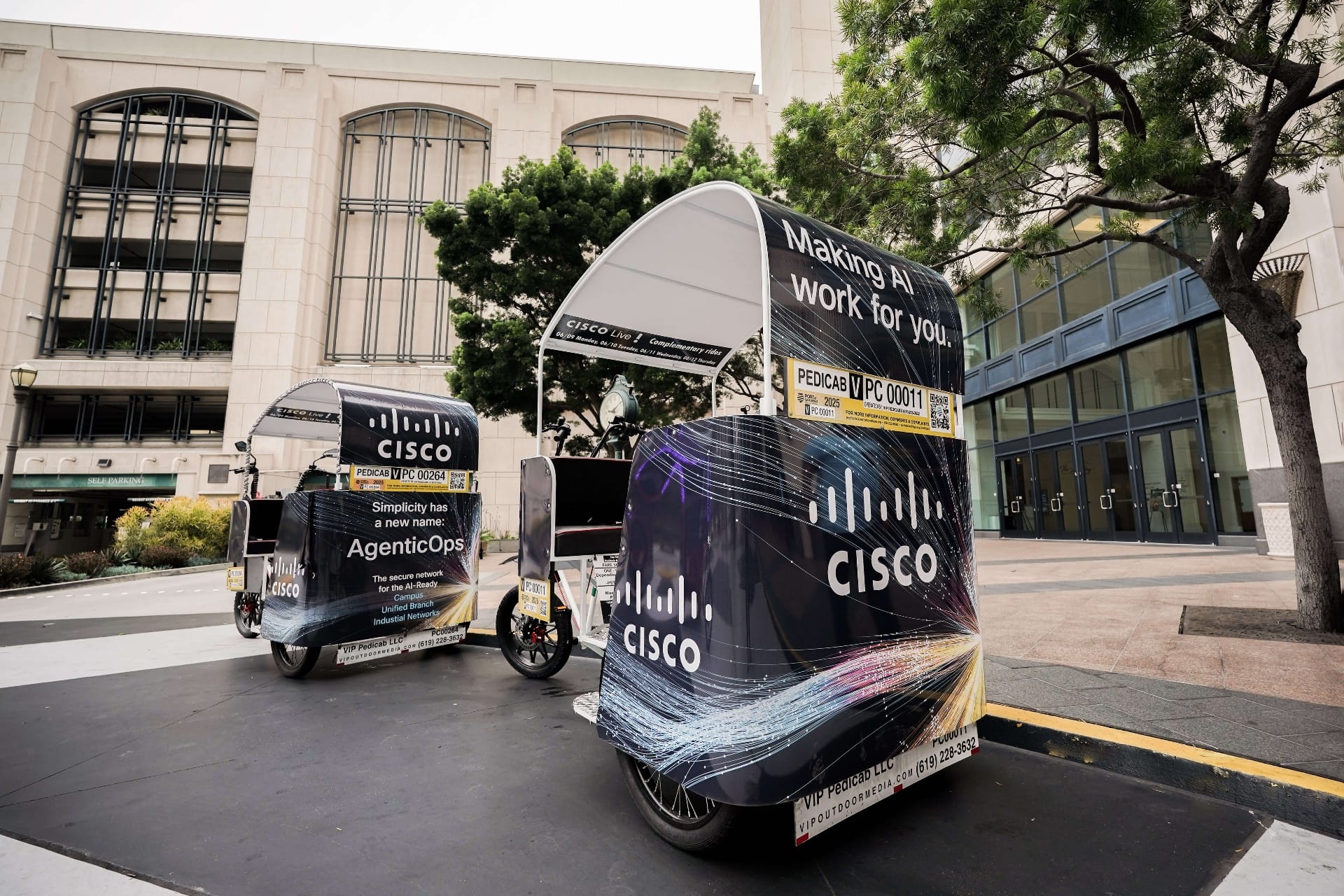 Cisco Live branded pedicab fleet parked at San Diego Convention Center