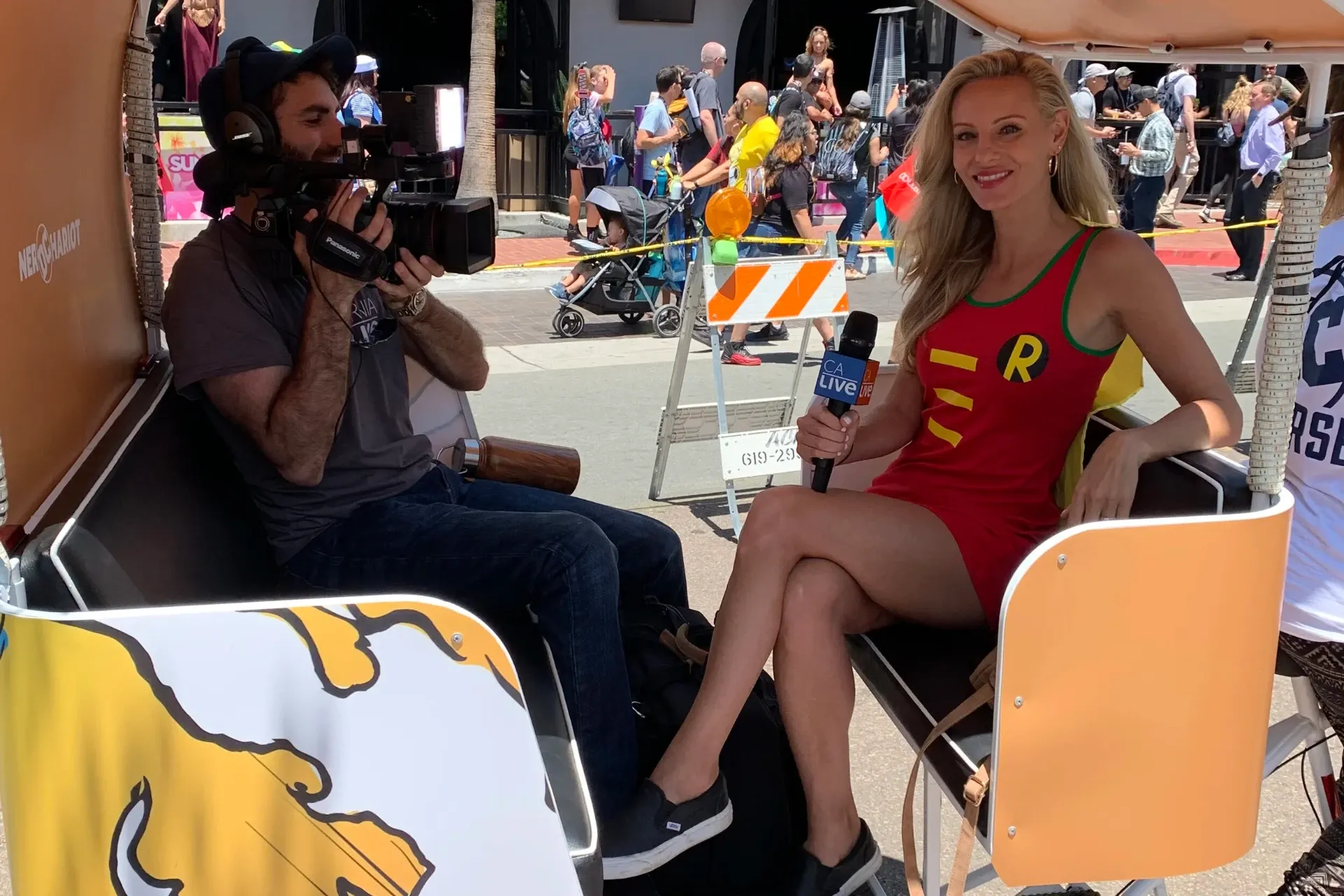 DC Nerd Chariot pedicab with Robin cosplay TV interview at Comic-Con