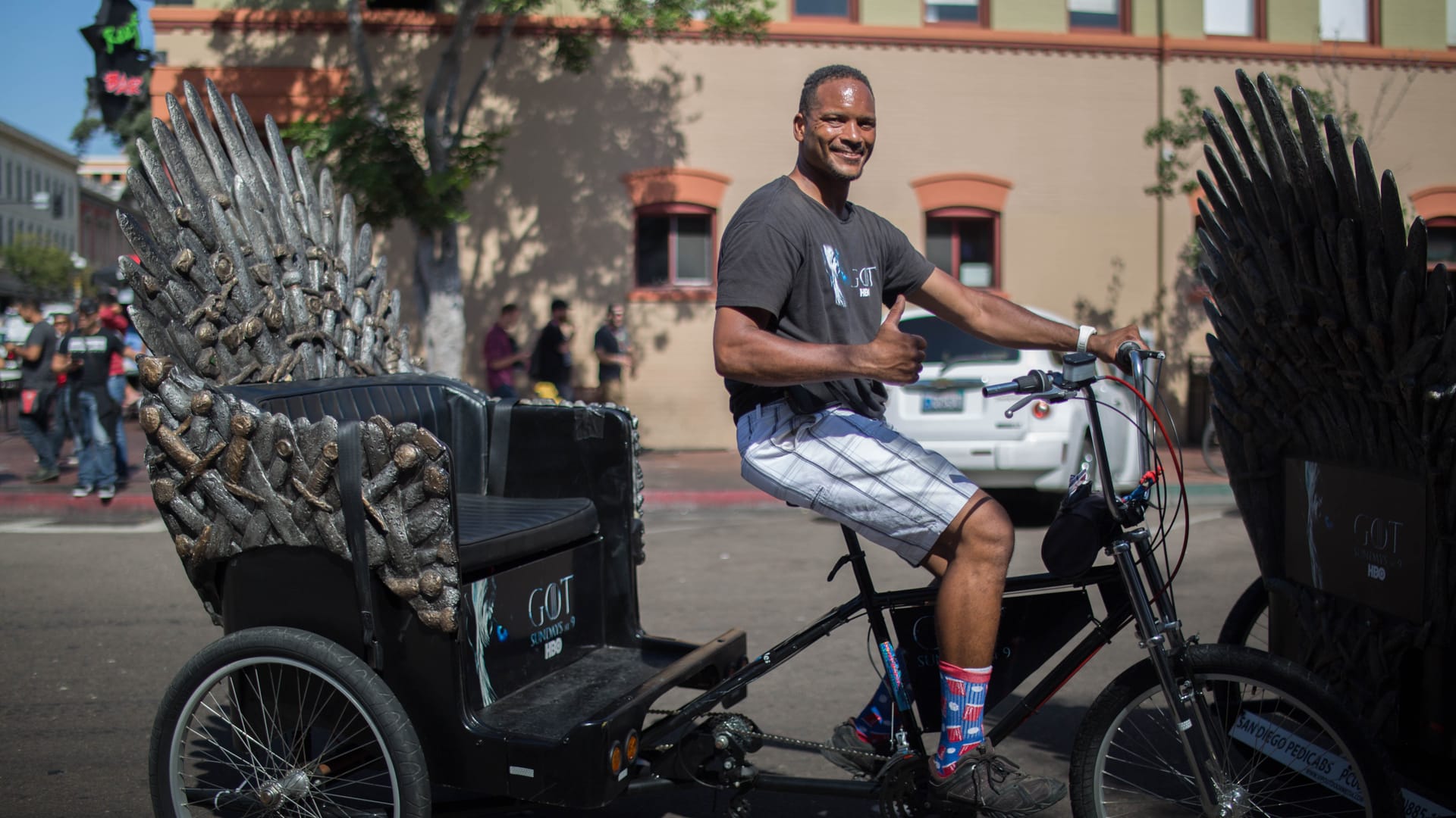 HBO Game of Thrones Iron Throne pedicab driver giving a thumbs up at San Diego Comic-Con
