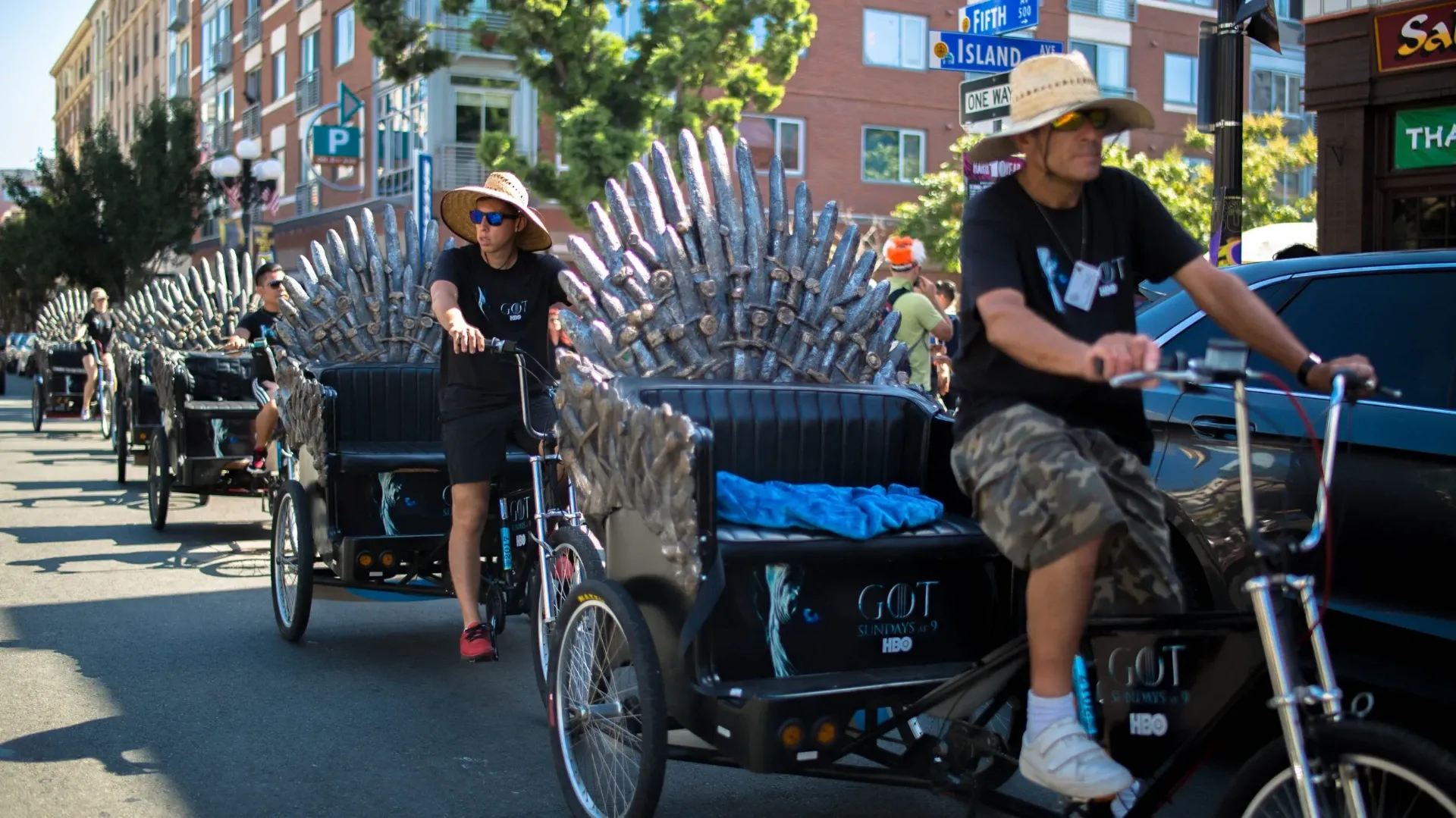 Game of Thrones Iron Throne pedicab fleet riding through downtown San Diego Comic-Con