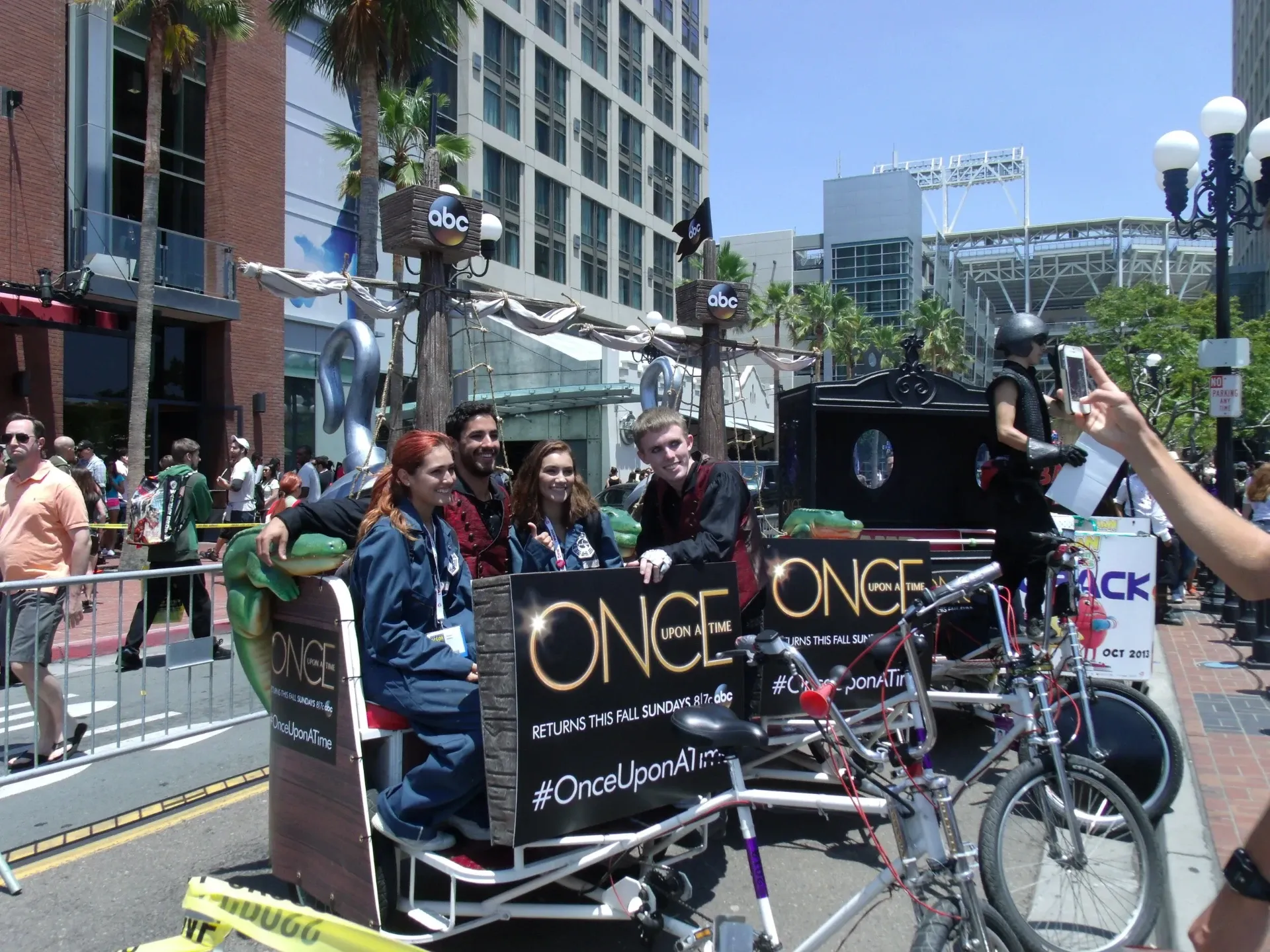 Pedicab passengers in downtown San Diego