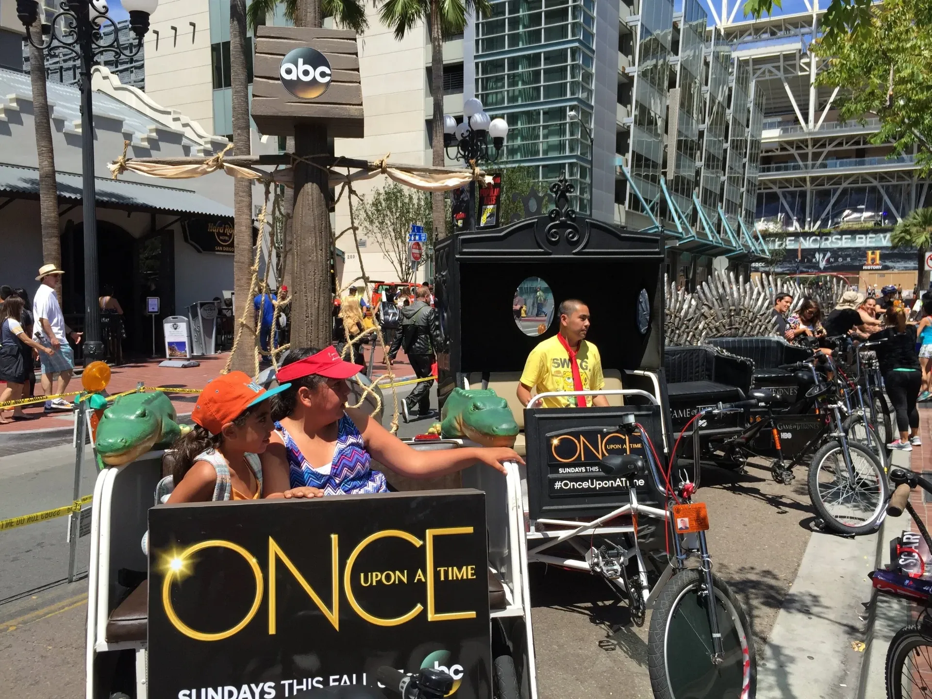 Once Upon a Time pedicab with kids riding through Gaslamp Quarter Comic-Con