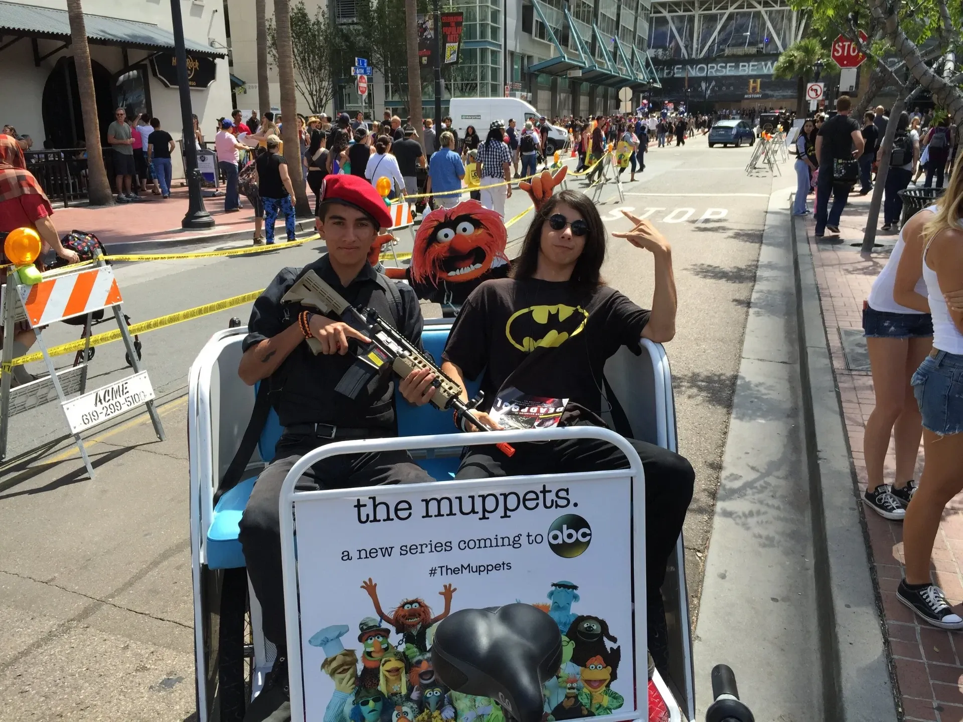 The Muppets ABC branded pedicab with fans riding at San Diego Comic-Con