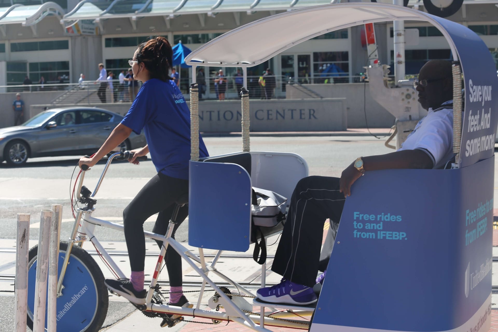UnitedHealthcare pedicab offering free rides to IFEBP convention at San Diego Convention Center